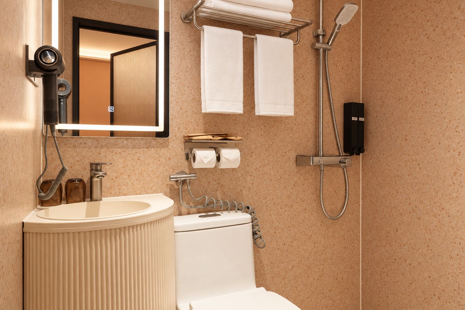 A modern bathroom with a round sink, a toilet, a mirror, a towel rack, and a handheld showerhead.