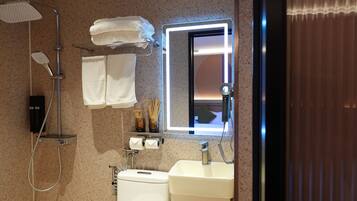 Shower, free toiletries, hair dryer, towels