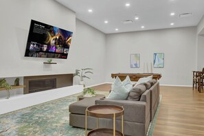 Smart TV, fireplace, foosball, table tennis