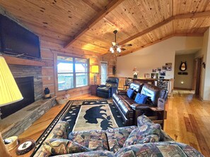 Smart TV, fireplace, table football, books