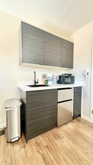 Fridge, microwave, coffee/tea maker, toaster