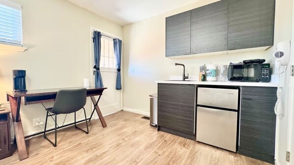 Fridge, microwave, coffee/tea maker, toaster