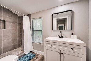 Shower, hair dryer, towels, soap