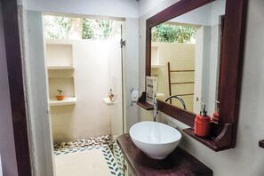 Shower, towels, soap, toilet paper