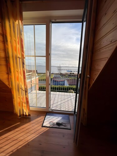 Ferienhaus 'Boddenperle' mit Meerblick, privater Terrasse und WLAN