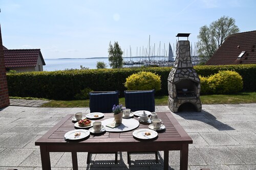 Ferienhaus 'Boddenperle' mit Meerblick, privater Terrasse und WLAN