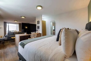 1 bedroom, desk, iron/ironing board, travel crib