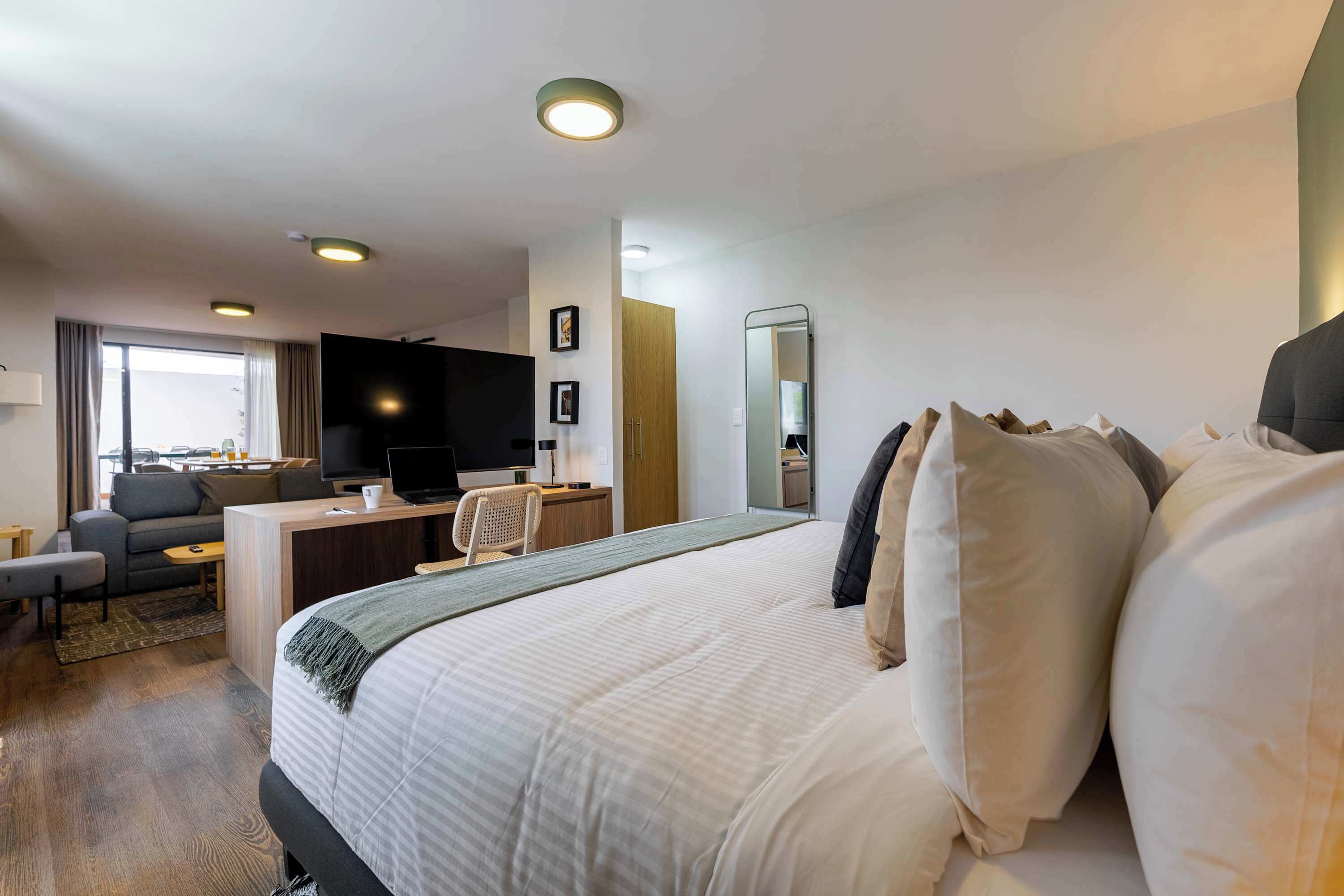 1 bedroom, desk, iron/ironing board, travel crib