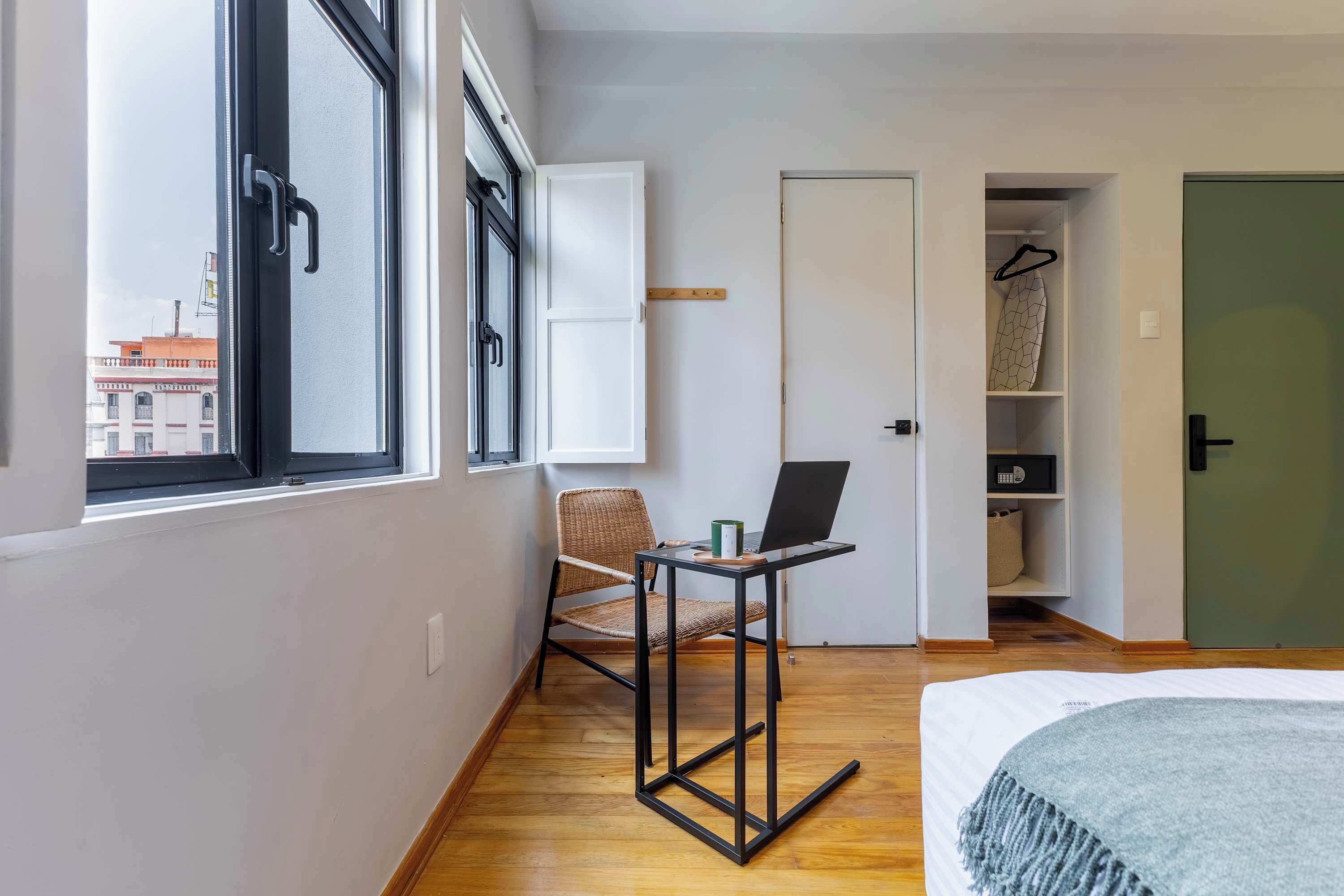 1 bedroom, desk, iron/ironing board, travel crib