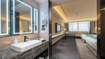 Down duvets, memory-foam beds, desk, laptop workspace