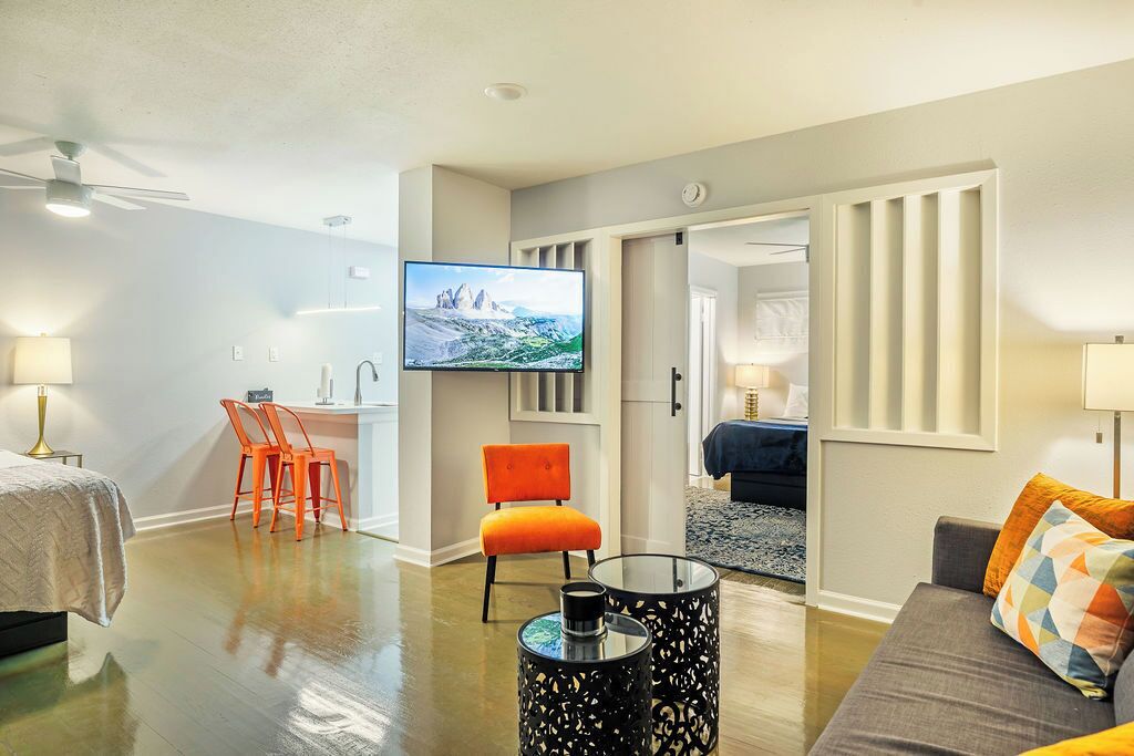 1 bedroom, desk, iron/ironing board, travel crib