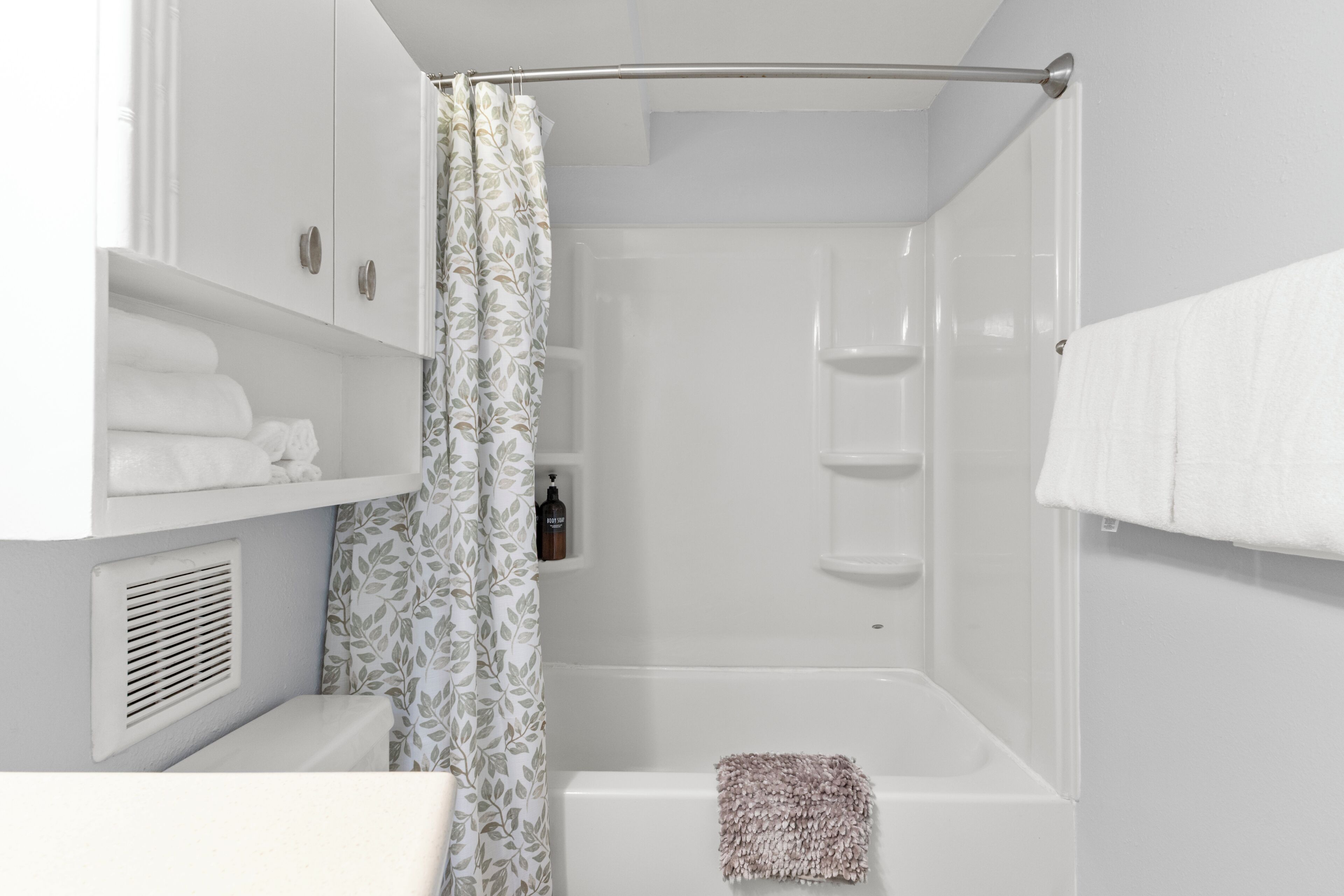 Hair dryer, towels, soap, toilet paper