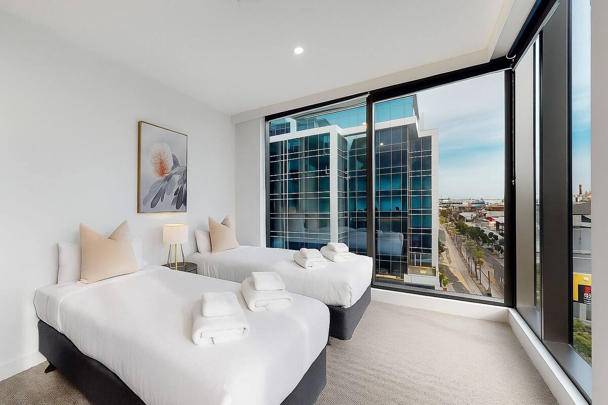 Two Bedroom Two Bathroom with Balcony and Outdoor Pool | WiFi (free), individually decorated, individually furnished, bed sheets