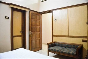 Habitación Deluxe | Camas extra, wifi gratis y ropa de cama 