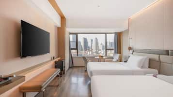 Executive Twin Room, City View | Down comforters, minibar, desk, laptop workspace