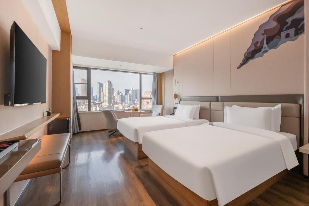 Standard Twin Room, City View | Down comforters, minibar, desk, laptop workspace