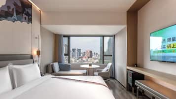 Superior Double Room, City View | Down comforters, minibar, desk, laptop workspace