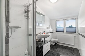 Douche, sèche-cheveux