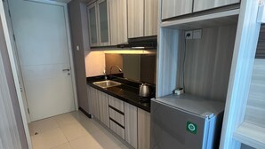 Studio, Balcony, City View | Private kitchenette - Amor Studio Pakuwon City Mall Surabaya Timur  (Surabaya)