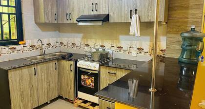 5 minute ride to the Kigali Genocide Memorial. Double room with balcony