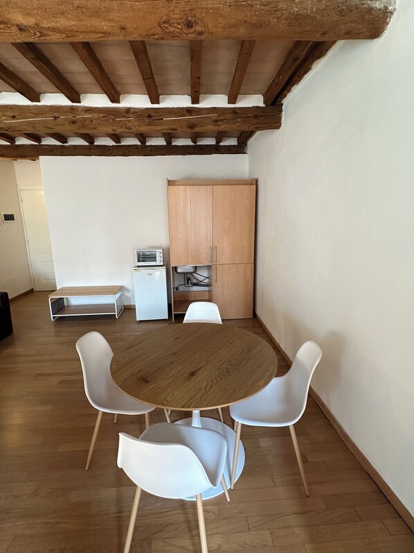 Comfort Apartment | Living area | 21-inch flat-screen TV with digital channels