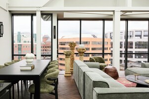 Penthouse Studio | Living area | 43-inch Smart TV with digital channels, streaming services