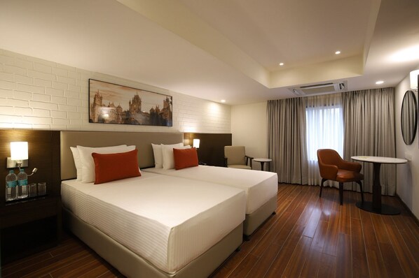 Habitación Deluxe con 1 cama doble o 2 individuales