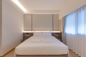 Deluxe tweepersoonskamer | Een bureau, gratis wifi, beddengoed