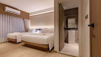 Chambre Familiale, 2 chambres | Coffres-forts dans les chambres, bureau, Wi-Fi gratuit, draps fournis