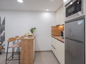 Fridge, microwave, coffee/tea maker
