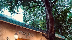 A building with a sign reading "respira Villas." - Respira Villaas (Calangute)