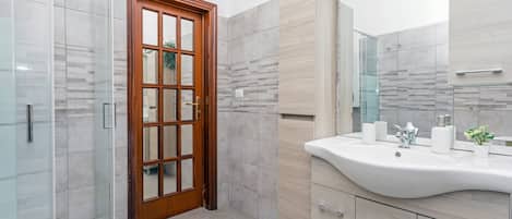 Shower, free toiletries, hair dryer, bathrobes