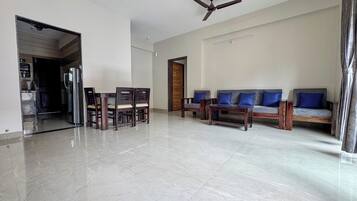 Deluxe Apartment, Balcony, Sea View | Living area