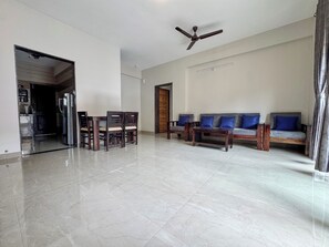 Deluxe Apartment, Balcony, Sea View | Living area | Ping pong