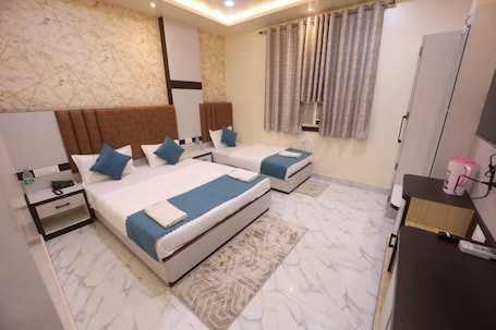 Deluxe Triple Room | Desk, laptop workspace, free WiFi. Radhey Krishna P Guest House