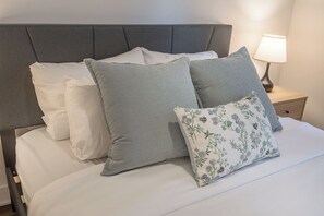 1 bedroom, desk, iron/ironing board, travel crib