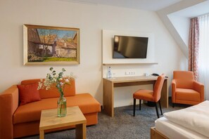 Quarto casal conforto | Área de estar