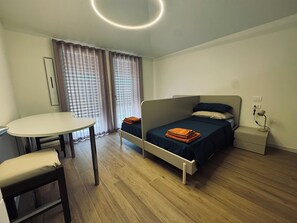 ペントハウス コートヤードビュー | アイロン / アイロン台、WiFi (無料)、ベッドシーツ、車椅子でアクセスできる設備