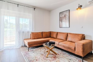 Perhehuoneisto, 1 makuuhuone (Plitvice Lakes Apartments and Rooms 2) | Oleskelualue | 21–tuumainen taulutelevisio, jossa kaapelikanavat