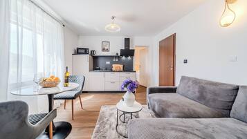 Family Apartment, 1 Bedroom (Plitvice Lakes Apartments and Rooms 3) | Living area | 21-inch flat-screen TV with cable channels