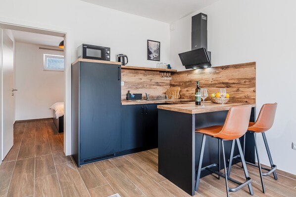 Family Apartment, Multiple Bedrooms (Plitvice Lakes Apartments and Rooms 2) | Private kitchenette | Fridge, microwave, oven, stovetop
