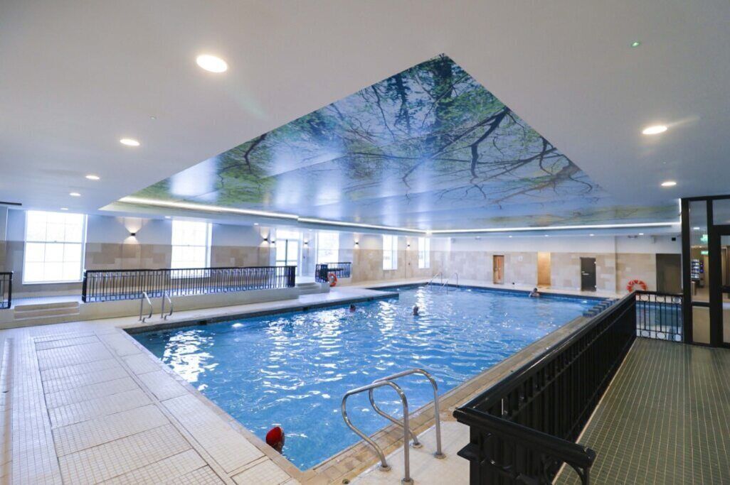 Indoor pool, open 6:00 AM to 9:00 PM, pool loungers