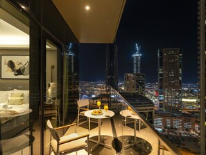 Private balcony with night city views