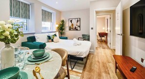 1 bedroom, desk, iron/ironing board, travel cot