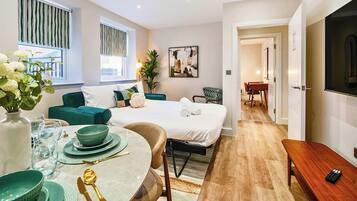 1 bedroom, desk, iron/ironing board, travel cot