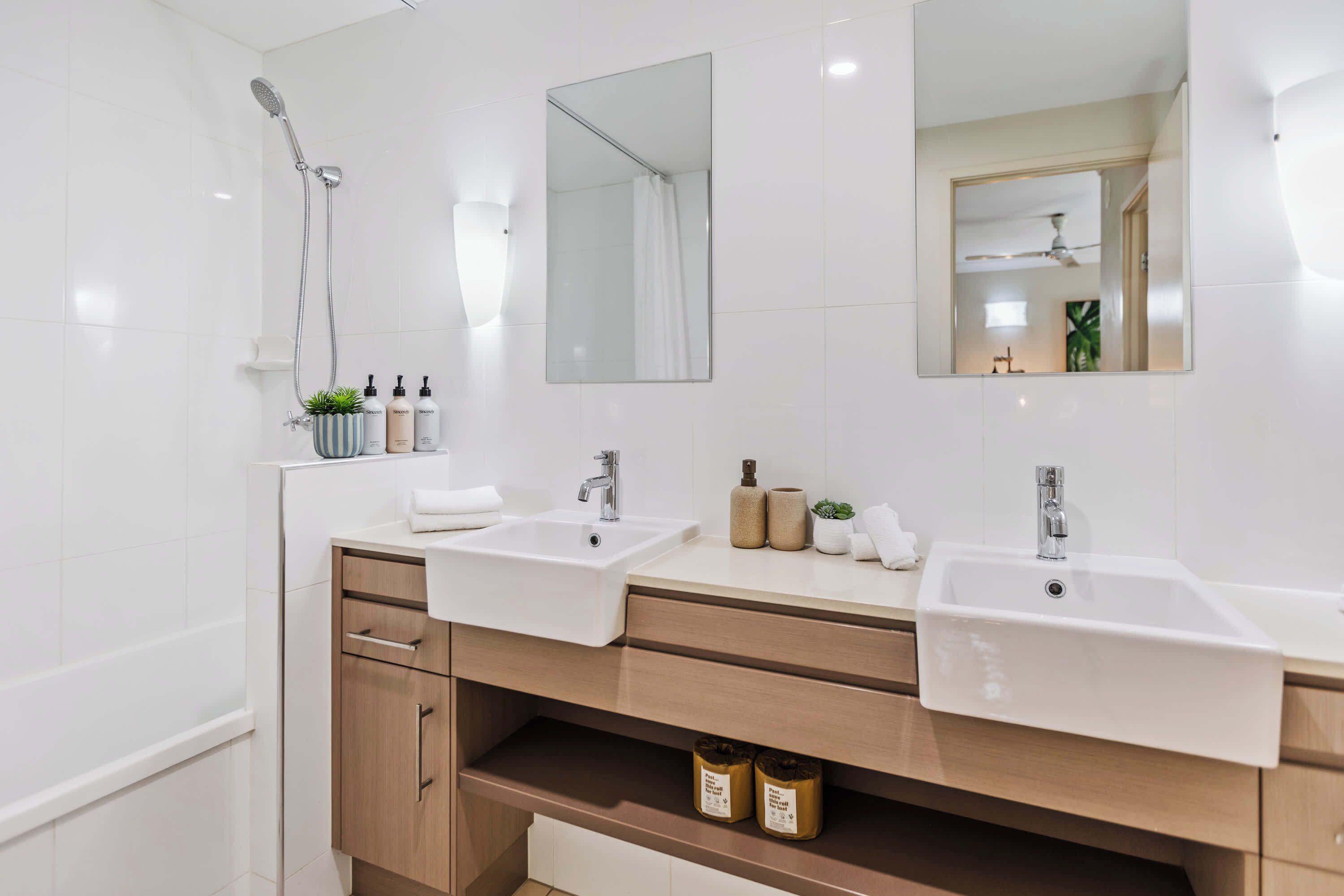 Shower, hair dryer, towels, shampoo