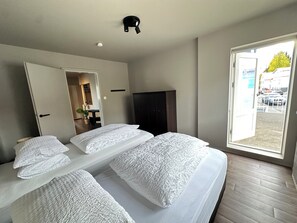 4 bedrooms, iron/ironing board, travel cot, WiFi