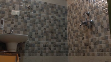 Deluxe Double Room, Balcony, Mountain View | Bathroom | Shower, free toiletries, slippers, towels