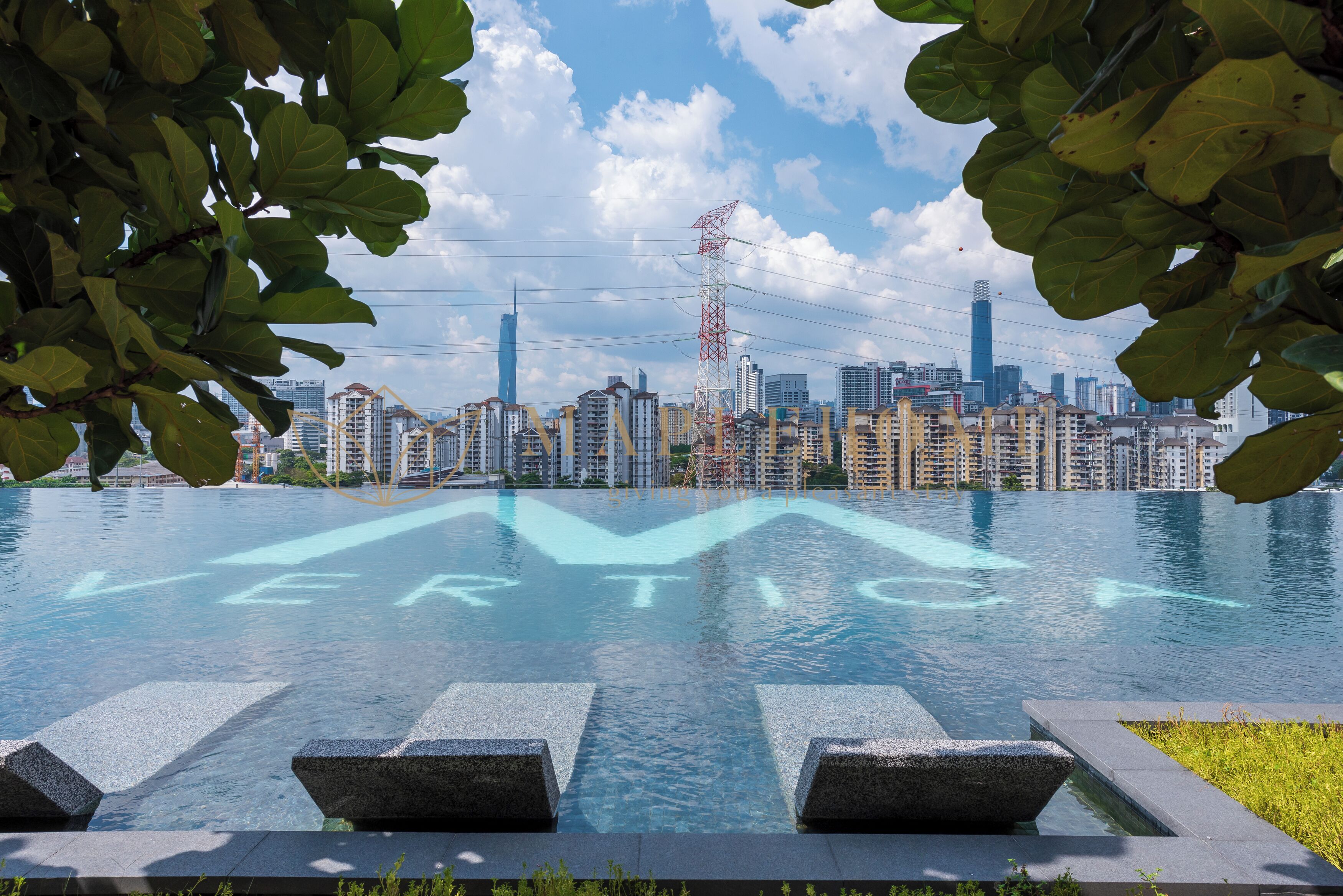 A pool with a city skyline in the background.