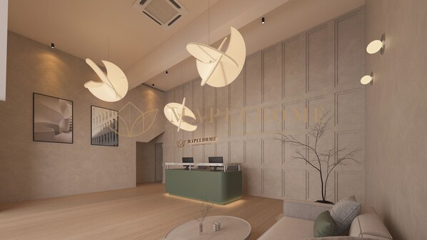 Un espace d’accueil moderne avec un comptoir vert, un décor minimaliste et une grande fenêtre.